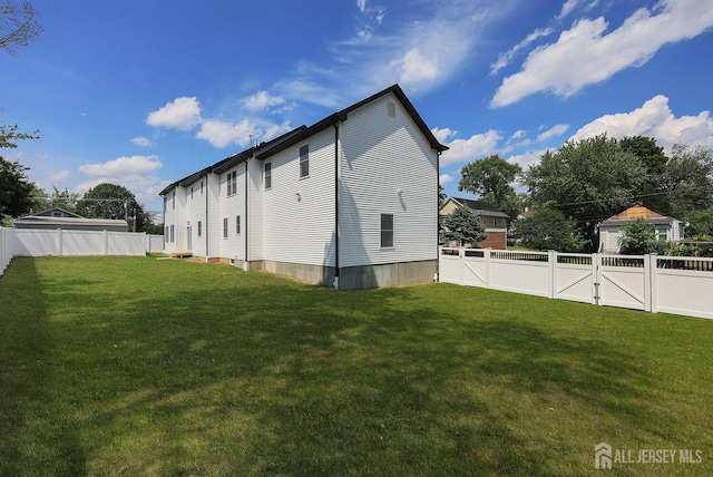 14 Thomasine St, Edison, NJ 08817 - back of property with a gate and a fenced backyard