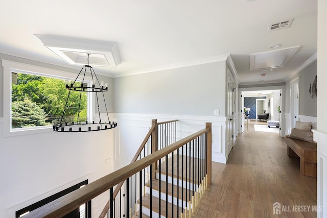 14 Thomasine St, Edison, NJ 08817 - corridor featuring attic access, an upstairs landing, ornamental molding, wood finished floors, and wainscoting