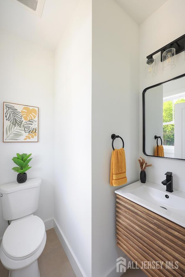 14 Thomasine St, Edison, NJ 08817 - half bath featuring vanity and tile patterned floors