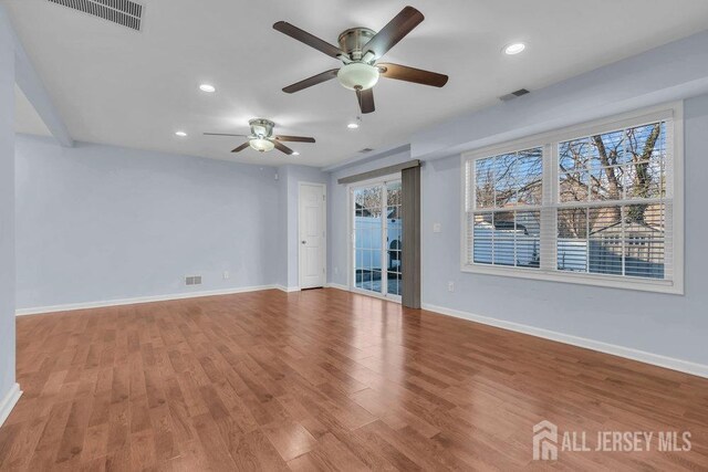 unfurnished room with light hardwood / wood-style floors and ceiling fan