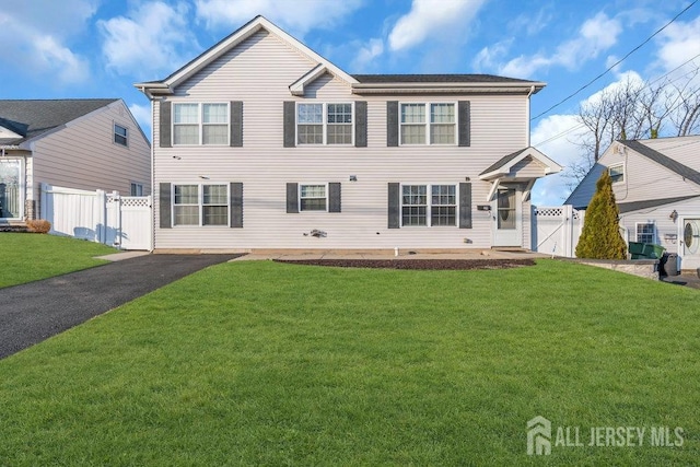 view of front of property with a front lawn