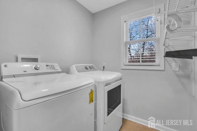 laundry area featuring washer and dryer