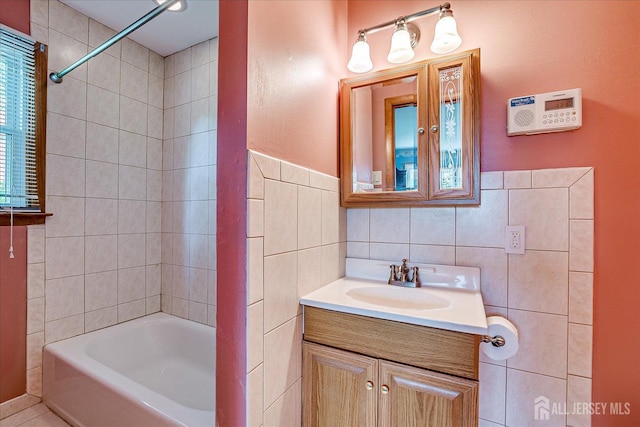108 Smith St, South Plainfield, NJ 07080 - full bath featuring tile walls, vanity, and bathtub / shower combination