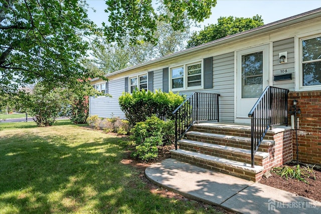 108 Smith St, South Plainfield, NJ 07080 - doorway to property with a yard