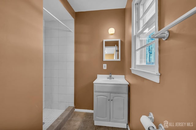 14 Ridgeview Rd, Jamesburg, NJ 08831 - bathroom with a tile shower, tile patterned floors, and vanity