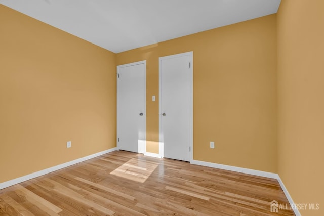 14 Ridgeview Rd, Jamesburg, NJ 08831 - empty room with baseboards and light wood-style flooring