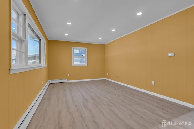 14 Ridgeview Rd, Jamesburg, NJ 08831 - empty room featuring a baseboard radiator, a baseboard heating unit, light wood-style floors, baseboards, and recessed lighting