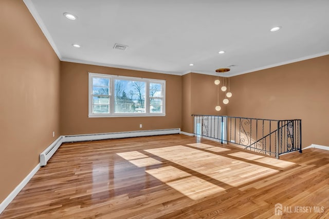14 Ridgeview Rd, Jamesburg, NJ 08831 - empty room with ornamental molding, wood finished floors, baseboards, baseboard heating, and recessed lighting