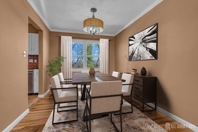 14 Ridgeview Rd, Jamesburg, NJ 08831 - dining space featuring crown molding, wood finished floors, and baseboards