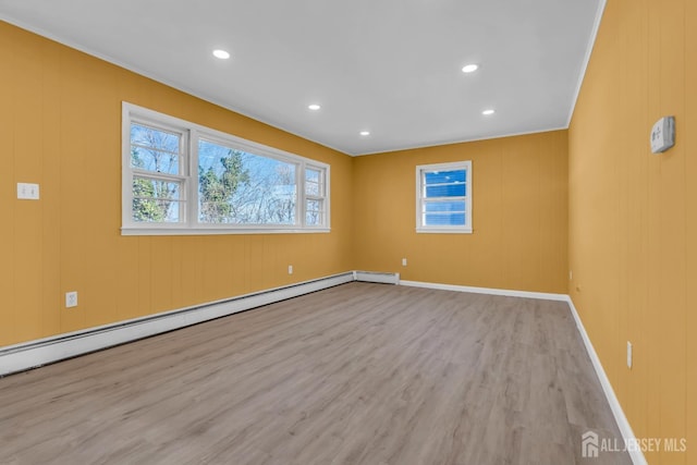 14 Ridgeview Rd, Jamesburg, NJ 08831 - unfurnished room featuring baseboard heating, wood finished floors, baseboards, and recessed lighting