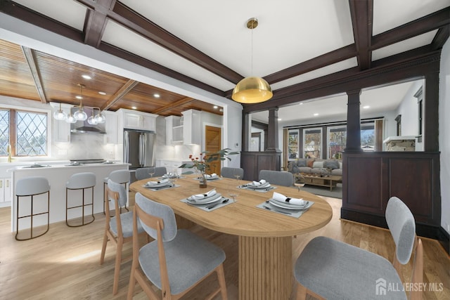 657 Amboy Ave, Edison, NJ 08837 - dining area with ornate columns, light wood-type flooring, healthy amount of natural light, beam ceiling, and recessed lighting