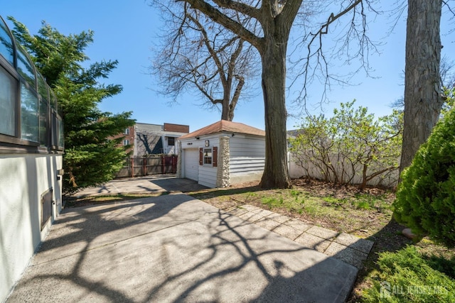 657 Amboy Ave, Edison, NJ 08837 - view of patio / terrace featuring driveway and an outdoor structure