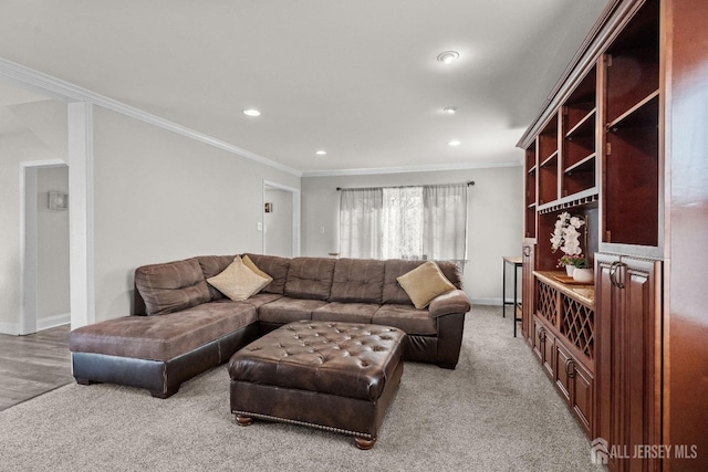 living area featuring baseboards, ornamental molding, light carpet, and recessed lighting