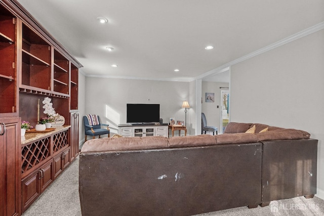 living room featuring ornamental molding, recessed lighting, and light carpet