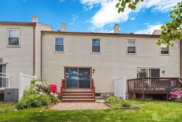 32 Astor Ct, Sayreville, NJ 08872 - back of property featuring central air condition unit, a wooden deck, entry steps, and a yard