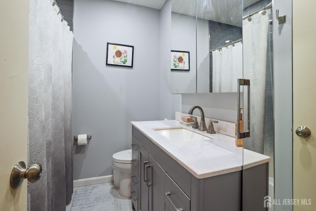 32 Astor Ct, Sayreville, NJ 08872 - bathroom featuring baseboards, vanity, and toilet