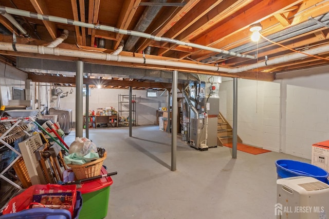 32 Astor Ct, Sayreville, NJ 08872 - unfinished below grade area featuring heating unit and stairway