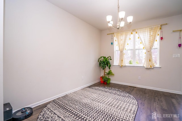 102 Matutina Rd, Monroe, NJ 08831 - unfurnished room with wood finished floors and a chandelier