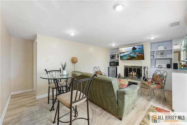 living room featuring light wood-type flooring