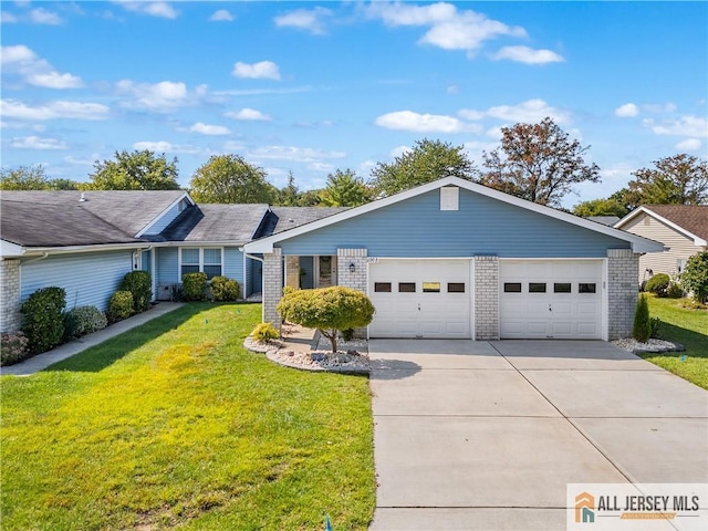 ranch-style home featuring a front yard and a garage