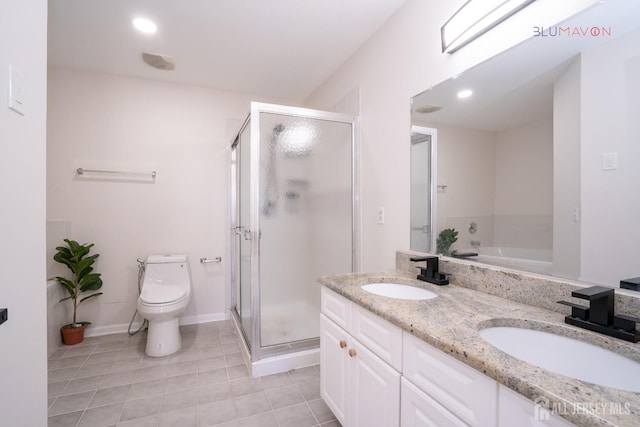 full bathroom with toilet, vanity, tile patterned flooring, and plus walk in shower