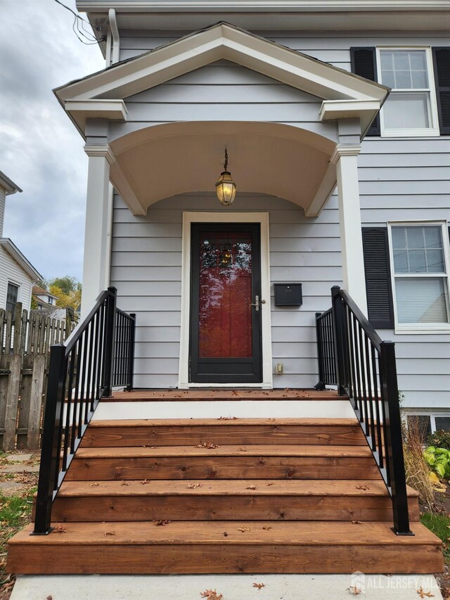 entrance to property with a porch