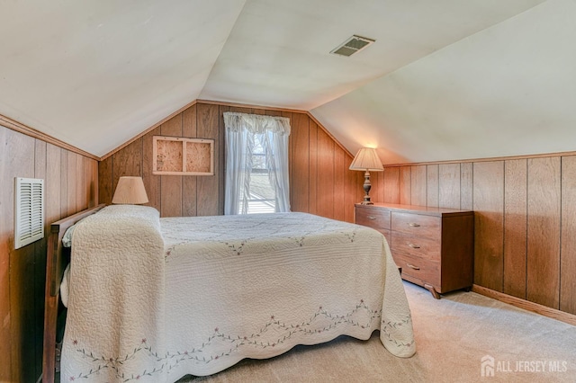 19 W Joffre Ave W, Milltown, NJ 08850 - bedroom with wood walls, vaulted ceiling, and light colored carpet
