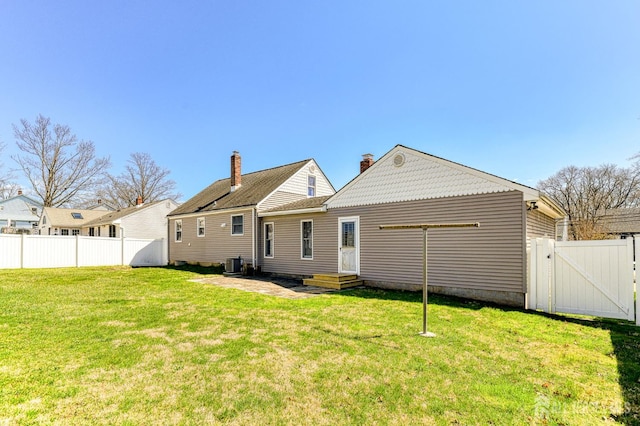 19 W Joffre Ave W, Milltown, NJ 08850 - back of property featuring a gate and a chimney