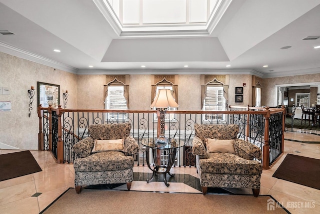 living area with an upstairs landing, visible vents, recessed lighting, and ornamental molding