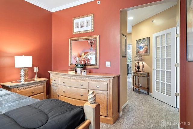 bedroom featuring light colored carpet, baseboards, and ornamental molding