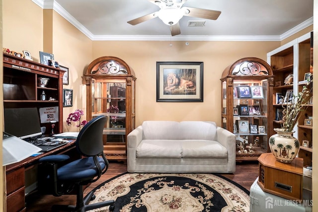 office with visible vents, crown molding, ceiling fan, and wood finished floors