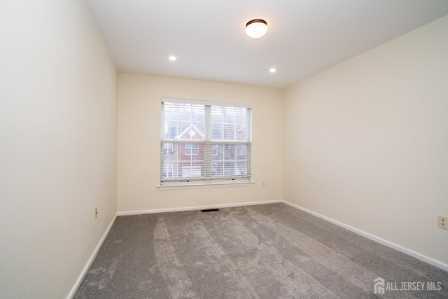 empty room with carpet floors