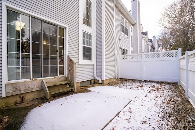 view of snow covered patio