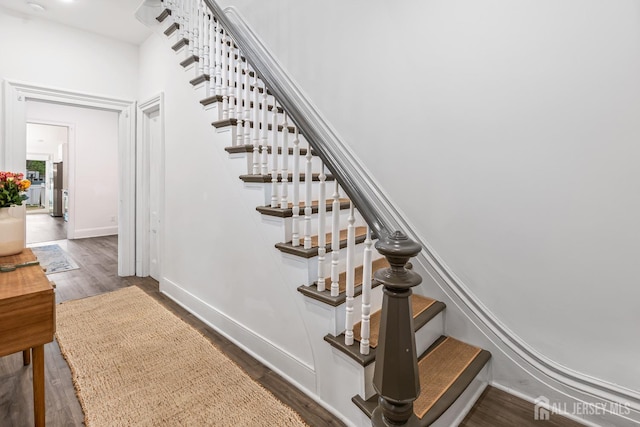 94 2nd St, Keyport, NJ 07735 - staircase with wood finished floors and baseboards