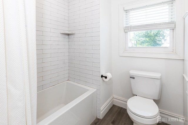 94 2nd St, Keyport, NJ 07735 - full bath with toilet, baseboards, wood finished floors, and shower / bath combination with curtain