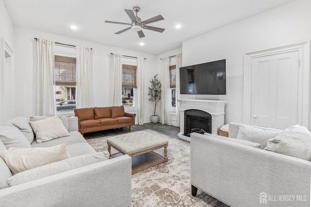 94 2nd St, Keyport, NJ 07735 - living area featuring a ceiling fan, light wood-style floors, a fireplace, and recessed lighting