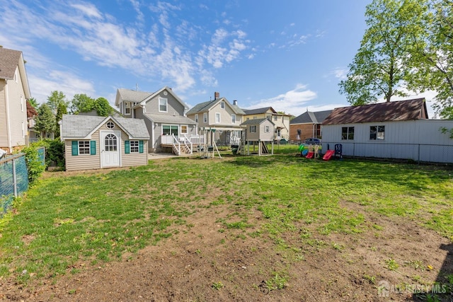 94 2nd St, Keyport, NJ 07735 - view of yard featuring a playground, a residential view, and an outbuilding
