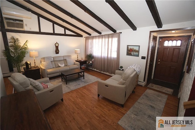living area featuring wood finished floors, a baseboard radiator, and an AC wall unit