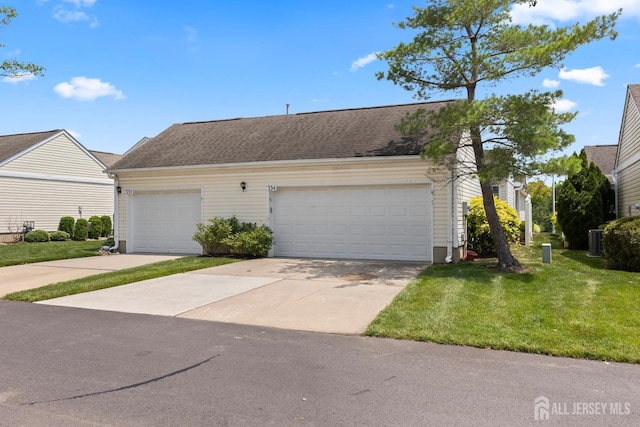 334 Waterside Blvd, Monroe, NJ 08831 - view of front facade with a front lawn and a garage