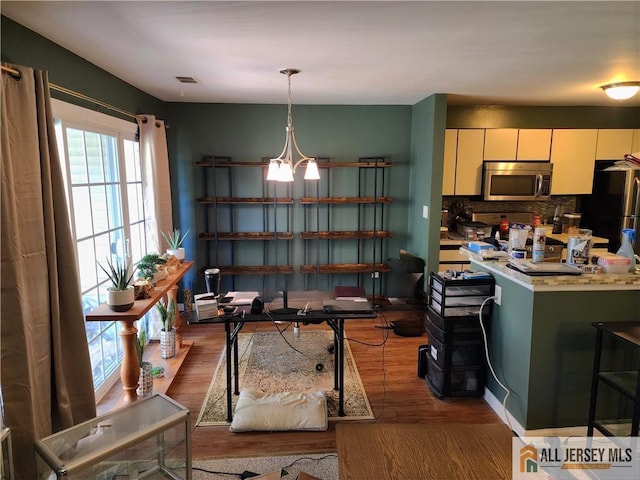 6232 Cedar Ct, South Brunswick, NJ 08852 - dining space with wood finished floors