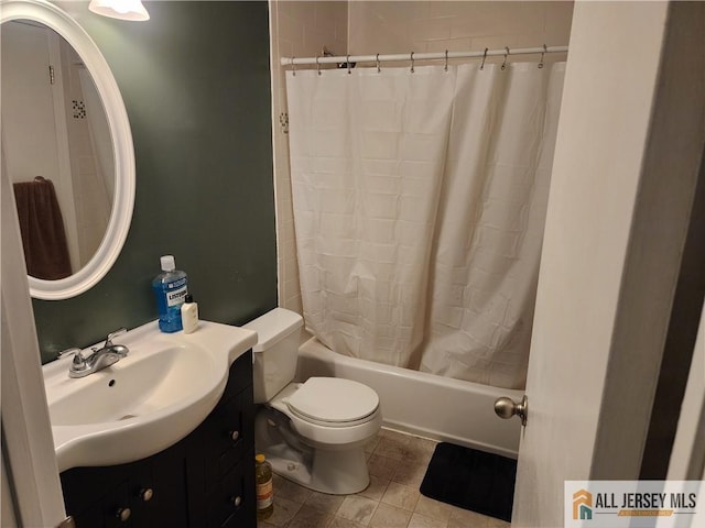 6232 Cedar Ct, South Brunswick, NJ 08852 - bathroom featuring shower / bath combination with curtain, vanity, toilet, and tile patterned flooring