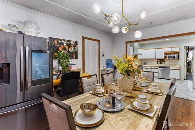 92 Main St, Helmetta, NJ 08828 - dining area with ornamental molding, wood finished floors, and a chandelier