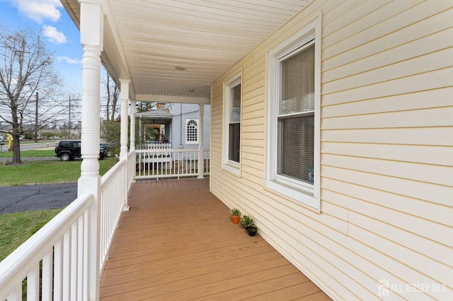 wooden deck with a porch