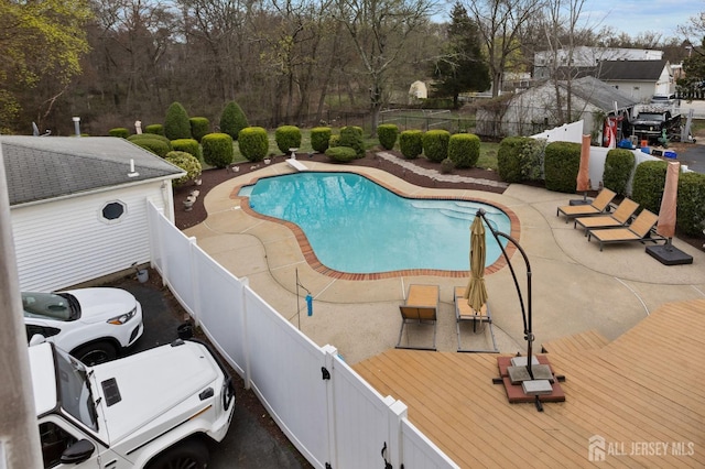 92 Main St, Helmetta, NJ 08828 - view of swimming pool with a fenced backyard and a deck