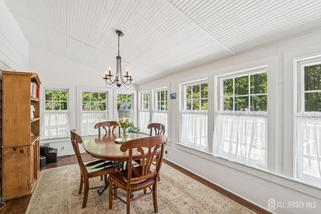 59 S Main St, Cranbury, NJ 08512 - dining area featuring a chandelier, vaulted ceiling, wooden ceiling, and wood finished floors