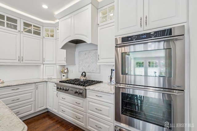 59 S Main St, Cranbury, NJ 08512 - kitchen with stainless steel appliances, white cabinets, decorative backsplash, and recessed lighting