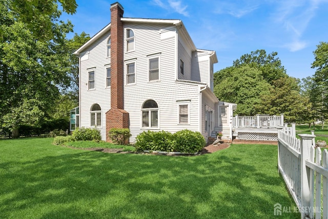 59 S Main St, Cranbury, NJ 08512 - view of front of property featuring a chimney and a deck