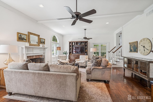 59 S Main St, Cranbury, NJ 08512 - living area with wood-type flooring, a brick fireplace, a ceiling fan, stairs, and recessed lighting