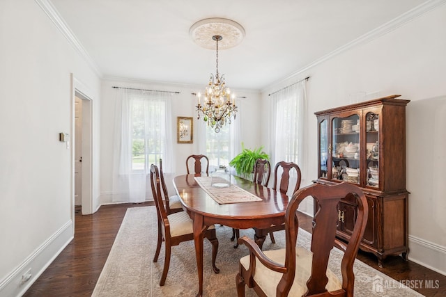 59 S Main St, Cranbury, NJ 08512 - dining space featuring a chandelier, crown molding, and dark wood-type flooring