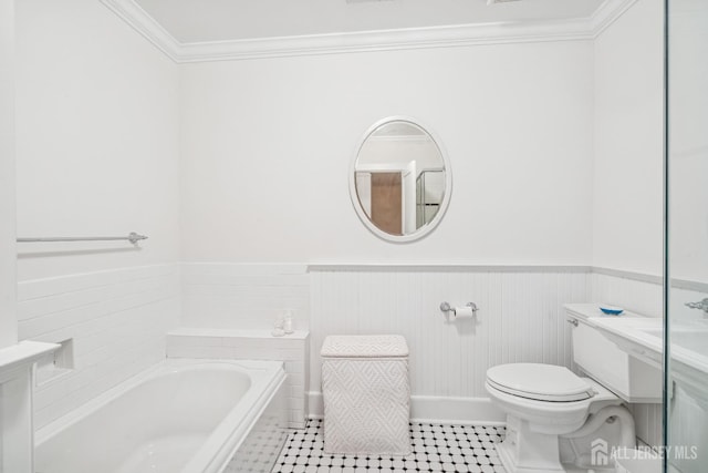 59 S Main St, Cranbury, NJ 08512 - bathroom with a garden tub, crown molding, wainscoting, and tile patterned flooring
